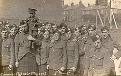 Group photograph of soldiers belonging to the 6th (Service) Battalion, Cameron Highlanders, which was part of the New Army, formed at Inverness in September 1914. The battalion moved through Hampshire, first to Aldershot and then Bramshott and later Basingstoke in February 1915.