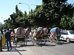 Cycle rickshaws in Dhaka, Bangladesh. The city is known as the Rickshaw Capital of the World.