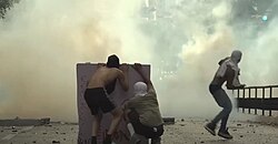 Protesters in Caracas fighting against the public forces during the 2024 Venezuelan protests