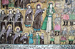Tilework inside Mu'awin ul-Mulk husayniyya, Kermanshah, Iran, depicting Ali al-Sajjad, Zaynab bint Ali and other prisoners being taken to Yazid's court