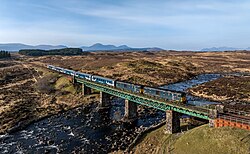 The Highland Sleeper crossing the Gaur Viaduct between Bridge of Orchy and Rannoch hauled by 2 Class 73s in 2025