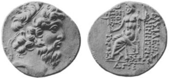 Coin of Demetrius II Nicator, showing the king with a beard and diadem. The reverse shows Zeus bearing Nike. The Greek inscription reads: ΒΑΣΙΛΕΩΣ ΔΗΜΗΤΡΙΟΥ ΘΕΟΥ ΝΙΚΑΤΟΡΟΣ, Basileōs Dēmētriou Theou Nikatoros, "of God King Demetrius, the Victor."