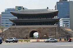 The original YTN tower (right background) with Namdaemun in the foreground, looking through open doors at the back of gate