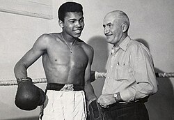 Cassius Clay and his trainer Joe E. Martin, January 1960