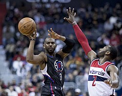 Chris Paul with the Los Angeles Clippers, left, passes to a teammate.