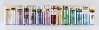 Glass vials with ground vitreous enamel powder in different colors