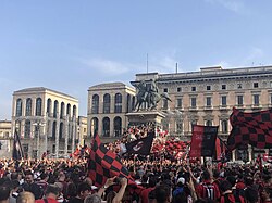 Rossoneri fans celebrating their 2021–22 Serie A win in Piazza del Duomo, Milan