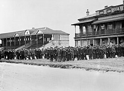 New recruits to the Lincolnshire Regiment parade on Lincoln Racecourse prior to leaving for Grantham, September 1914.