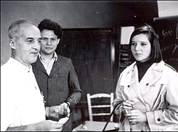 Leloir (left) with Armando Parodi and his daughter Amelia in the laboratory.
