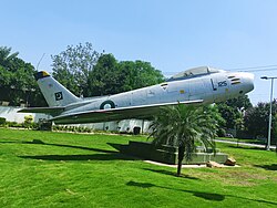 A retired Pakistan Air Force F-86F Sabre from the No. 26 Squadron "Black Spiders" on display at Nur Khan Airbase