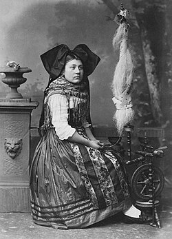 An Alsatian woman in traditional costume, photographed by Adolphe Braun in the 1870s