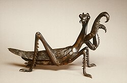 Bronze ink brush rest in the shape of a mantis, Edo period, Japan, c. 1800
