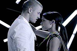 Timberlake with a female dancer in the music video.