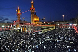 Shia Muslims gathered in prayer at the Shrine of Imam Ḥusayn in Karbala, Iraq