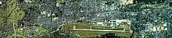 Aerial photograph from 1987 of Kakamigahara City Center: The JASDF Gifu Airbase is located on the south side of the city center.[2]