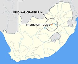 Map of South Africa showing the location of the Vredefort Dome, the remains of a 2.023-billion-year-old impact structure. The dashed line circle, 300 km (190 mi) in diameter, marks the extent of the original crater.