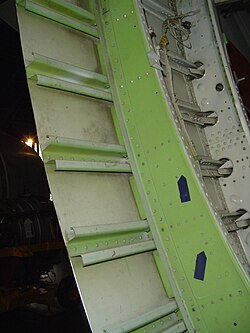 Sectioned fuselage of a Boeing 747 showing formers, stringers and skin all made of aluminium