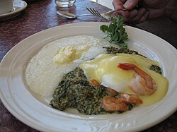 Eggs Sardou with gulf shrimp added and grits on the side