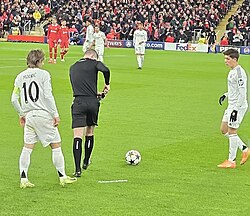 Modrić captaining Real Madrid in a 2024–25 UEFA Champions League phase match against Liverpool in November 2024