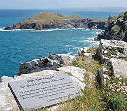 "FOR THE FALLEN" plaque with the Rumps promontory beyond