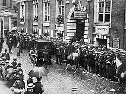 Lines of young men stretching out the doors of the recruiting offices in Whitehall, London, August 1914