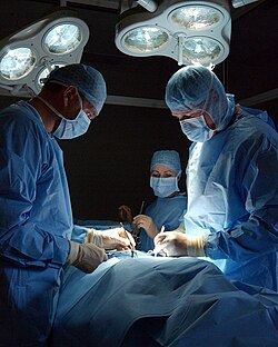 Royal Naval Reserve (RNR) nurses at work in the operating theatre