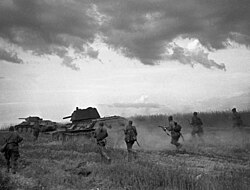 Soviet soldiers and T-34 tanks advancing near Bryansk in 1942