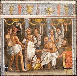 All-male theatrical troupe preparing for a masked performance, on a mosaic from the House of the Tragic Poet