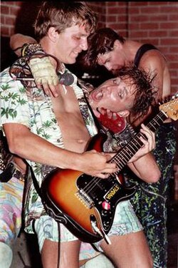 The Vandals performing in Tucson, Arizona, in 1984, showing original members Stevo and Jan Nils Ackermann, with bassist Chalmer Lumary in the background).
