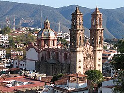 The façade of the Church of Santa Prisca de Taxco (1751–58) bristles with Mexican Churrigueresque ornamentation.