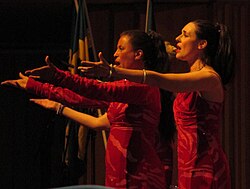 A trio of female singers performing at the Berwald Hall in 2016