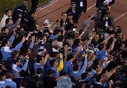 Uruguayan players celebrating their fifteenth Copa América title.