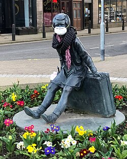 The "Wee Annie" statue in Gourock, Scotland, was given a face mask during the pandemic.