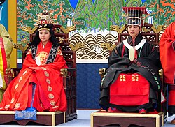 Traditional Korean royal wedding ceremony with the male wearing royal costume