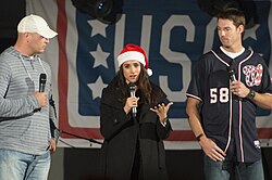 Markle addressing the audience during a USO show at Naval Station Rota, Spain, December 2014[192]