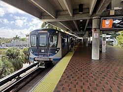 A northbound Orange Line trains stops at Dadeland North station
