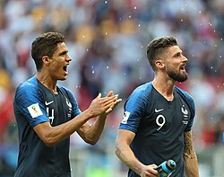 Giroud (right) with Raphael Varane at the 2018 FIFA World Cup
