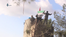 TFSA fighters hoist the Turkish flag and the Syrian independence flag on the top of Barsaya mountain.[150]