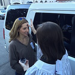 The season of Lent begins on Ash Wednesday, most notably by the public imposition of ashes. In this photograph, a woman receives a cross of ashes on Ash Wednesday outside an Anglican church.