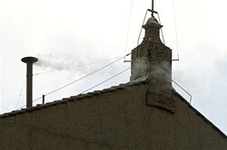 White smoke in the Sistine Chapel, indicating that a pope has been elected by the College of Cardinals.[100]