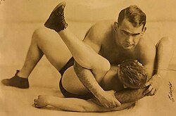 Ed "Strangler" Lewis pins an opponent in 1929,