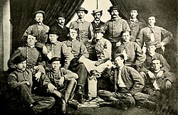 Confederate Cavalry Colonel John S. Mosby and some of his men-Top row (Left to Right): H. Lee Howison, W. Ben Palmer, John W. Puryear, Tom Booker, Alexander G. Babcock, Norman V. Randolph, Frank Rahm Second row: Robert B. Parrot, Thomas Throop, John W. Munson, John S. Mosby, Rat Noel, Charles H. QuarlesThird row: Walter W. Gosden, Henry T. Sinnott, Otho L. Butler, Issac A. Gentry