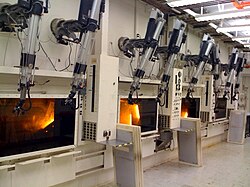 Most waste packaging, small-scale experimental fuel recycling chemistry and radiopharmaceutical refinement is conducted within remote-handled hot cells.