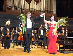 Gwhyneth Chen, soloist, and Maestro Edmon Colomer, after a performance with the Calgary Symphony, 2003