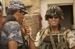 Iraqi soldier with "CamelBak" hydration system