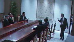 CCTV still showing numerous of President Yoon's cabinet members inside the Presidential Office shortly before the declaration. Defense Minister Kim is standing and gesturing how many more cabinet members are needed for a quorum for the meeting
