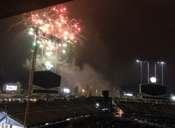 Dodger Stadium during a post-game "fireworks night" promotion, showing the new HD screens in place of the old rectangular video board and scoreboard