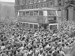 People gathered in Whitehall to hear Winston Churchill's victory speech, 8 May 1945.