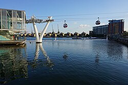The Emirates Air Line crosses the River Thames between Greenwich Peninsula and the Royal Docks.