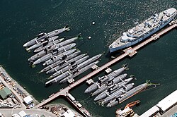 A total of sixteen decommissioned SSNs and SSBNs moored awaiting their fate at Puget Sound in May 1993